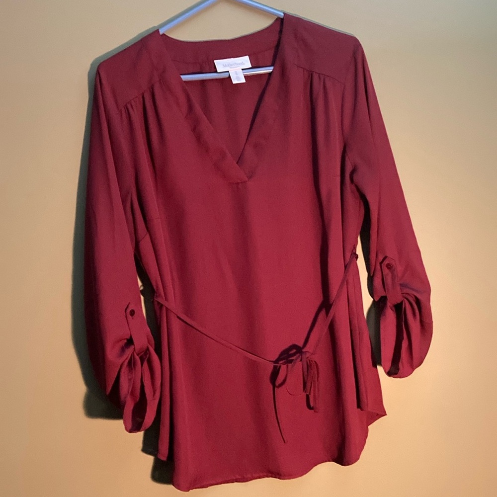Motherhood burgundy blouse with waist tie and tie up sleeves.